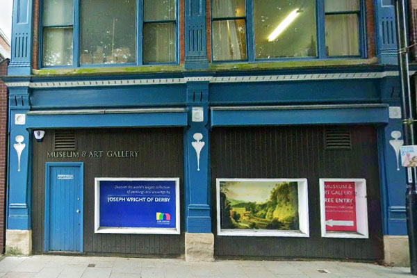Interior view of the Derby Museum & Art Gallery showcasing paintings and historical displays