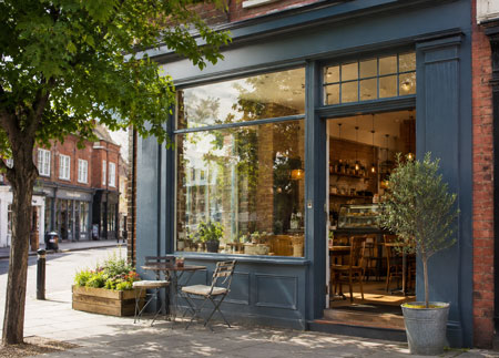 independent cafe or shop front in an English town